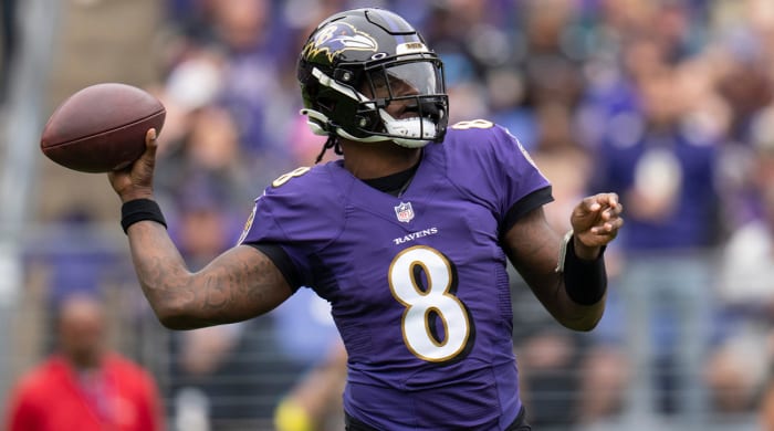 Oct 23, 2022; Baltimore, Maryland, USA; Baltimore Ravens quarterback Lamar Jackson (8) throws the ball against the Cleveland Browns during the first half at M&T Bank Stadium.